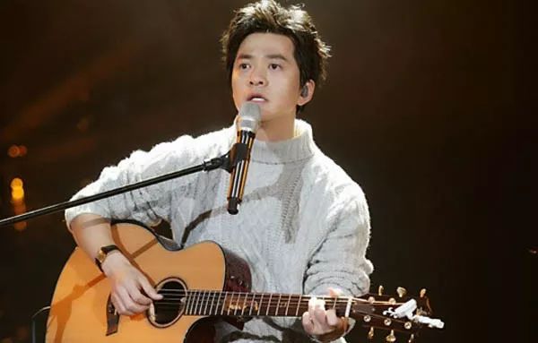 李健《异乡人》吉他弹唱曲谱